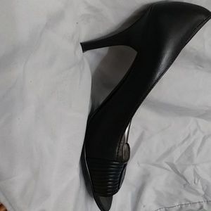 Black Calvin Klein pumps